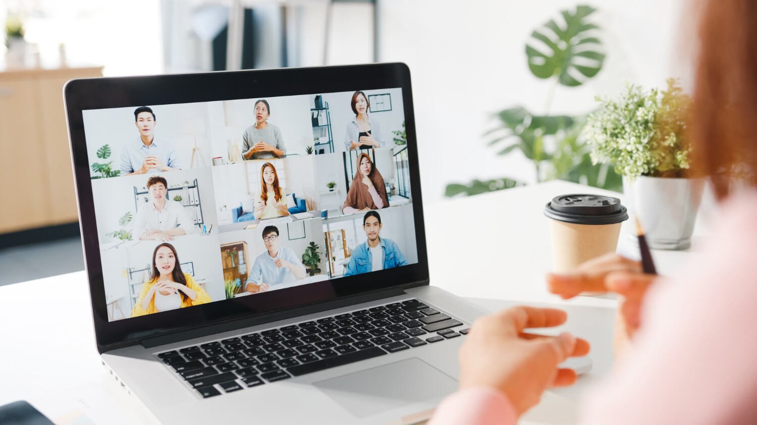 Laptop showing a team video conference call